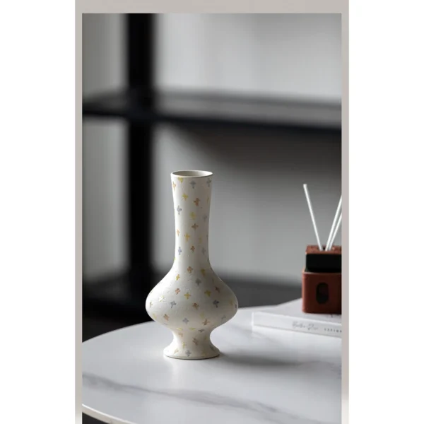 Artist-Made Hand-Painted Cross Pattern Long-Neck Vase in ivory — in a room setting