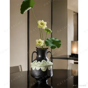 Artist-Made Twin-Handle Black Amphora in black — in a room setting
