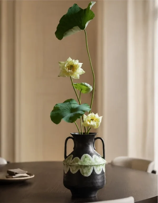Artist-Made Twin-Handle Black Amphora in black — in a room setting