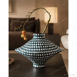 Artist-Made Hand-Painted Grid Diamond Vase for TV Consoles in black — in a room setting