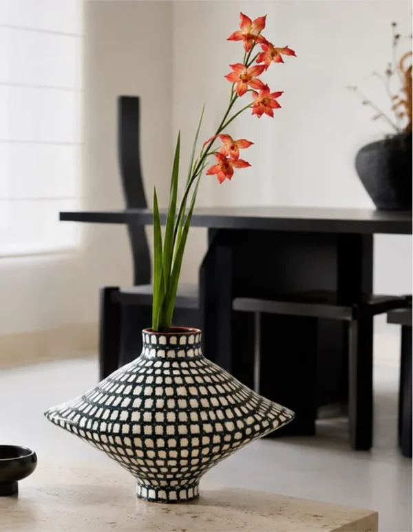 Artist-Made Hand-Painted Grid Diamond Vase for TV Consoles in black — in a room setting