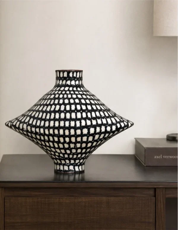 Artist-Made Hand-Painted Grid Diamond Vase for TV Consoles in black — in a room setting