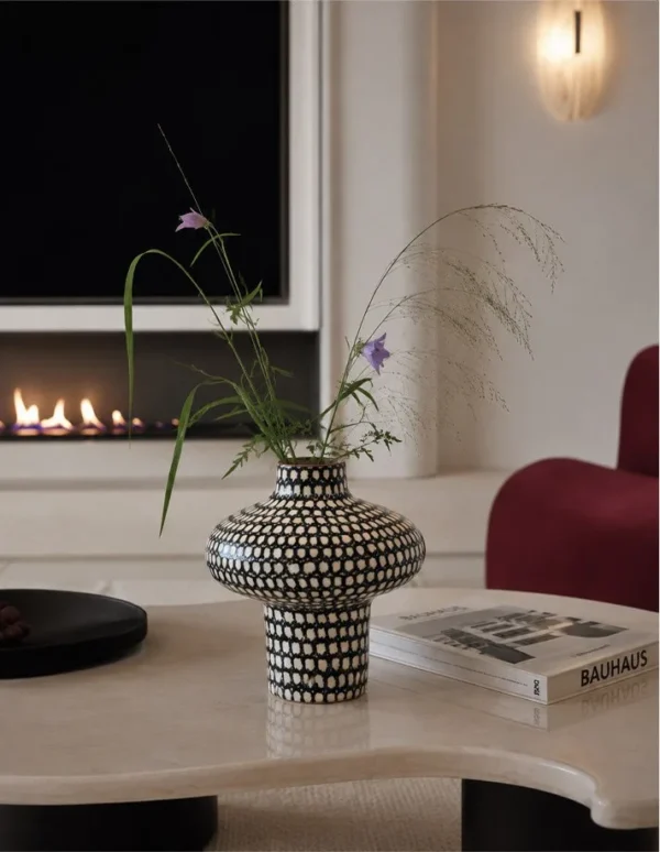 Artist-Made Hand-Painted Grid Mushroom Vase for TV Consoles in black — in a room setting