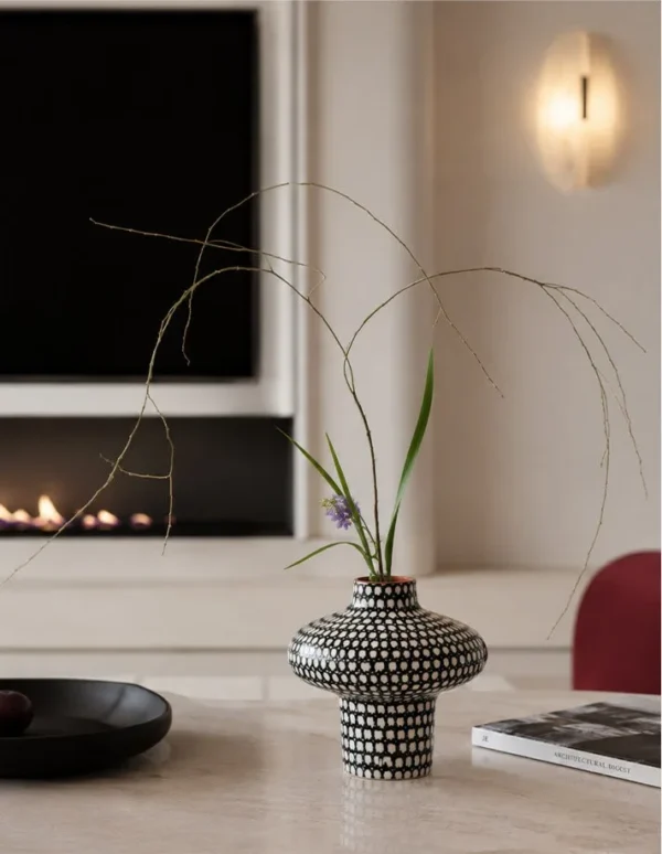 Artist-Made Hand-Painted Grid Mushroom Vase for TV Consoles in black — in a room setting