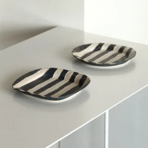 Hand-Painted Black and White Striped Dessert Plates in black — front view