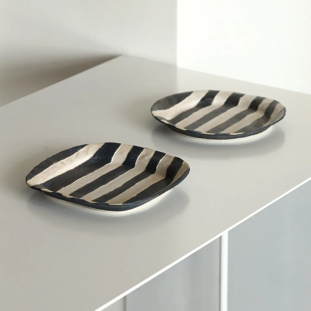 Hand-Painted Black and White Striped Dessert Plates in black — front view