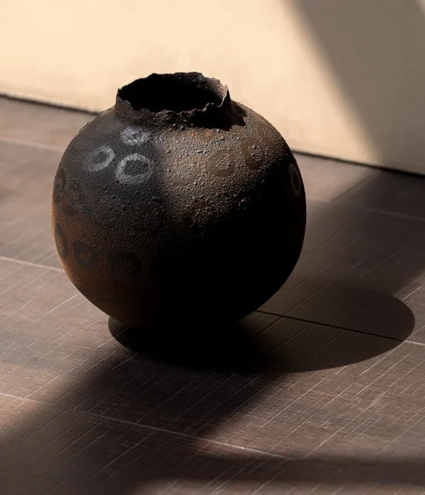 Artist-Made Hand-Painted Terracotta Ring Pattern Round Jar in rust — in a room setting