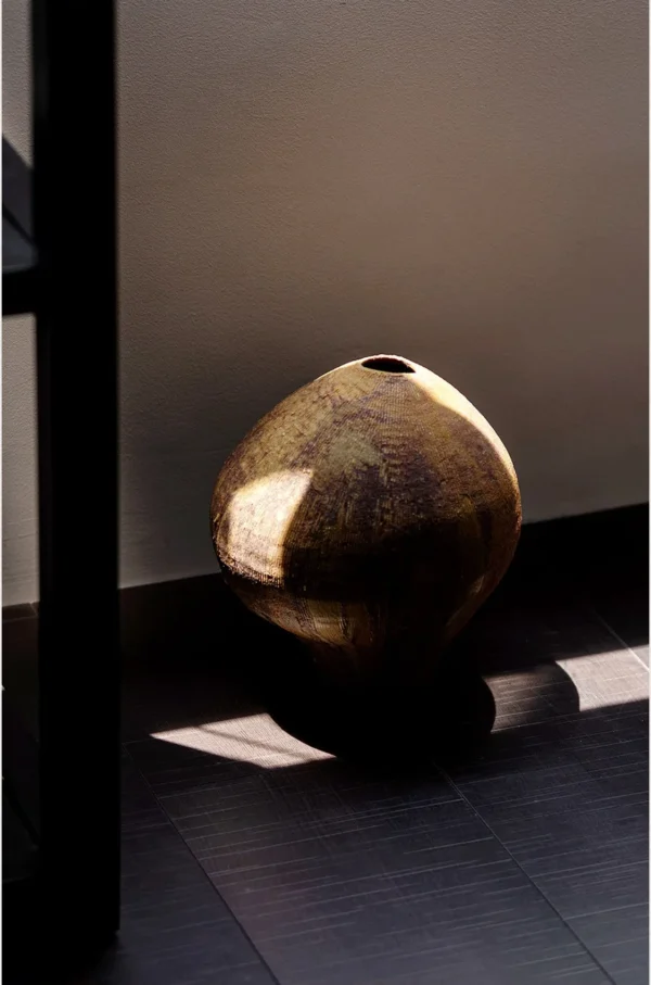 Artist-Made Hand-Pinched Oval Stoneware Vase in Bronze Glaze — in a room setting
