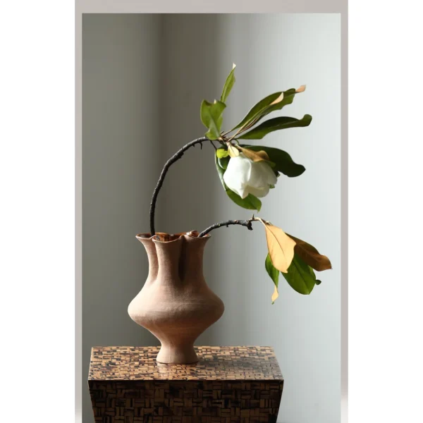 Artist-Made Hand-Pinched Three-Neck Terracotta Vase in rust — in a room setting