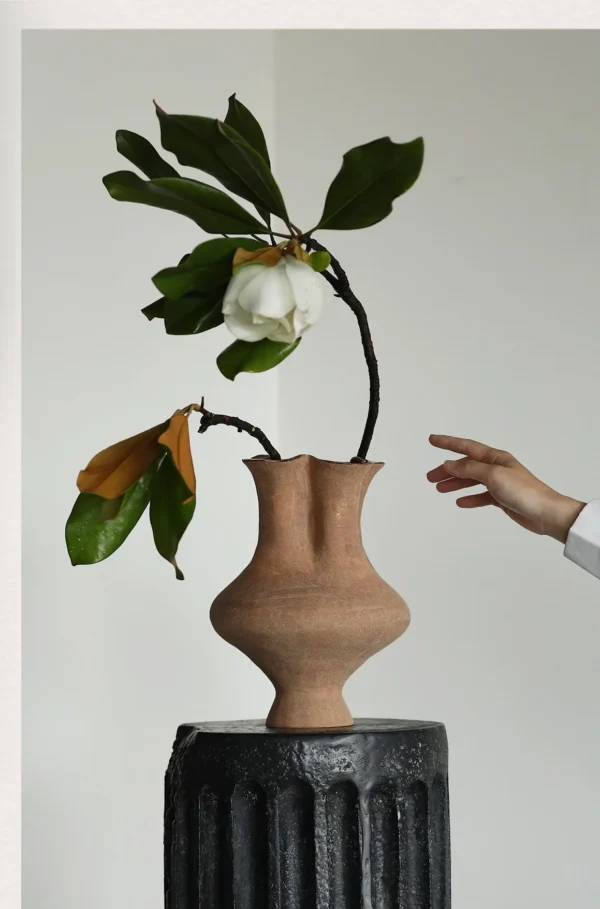 Artist-Made Hand-Pinched Three-Neck Terracotta Vase in rust — in a room setting