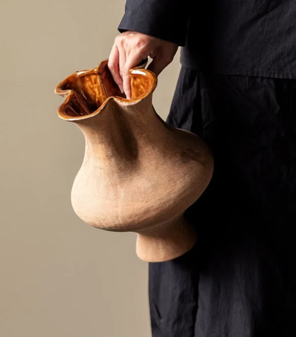 Artist-Made Hand-Pinched Three-Neck Terracotta Vase in rust — in a room setting