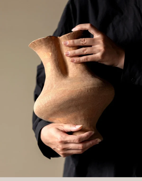 Artist-Made Hand-Pinched Three-Neck Terracotta Vase in rust — in a room setting