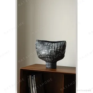 Artist-Made Ink-Brushed Footed Stoneware Vessel in black — in a room setting