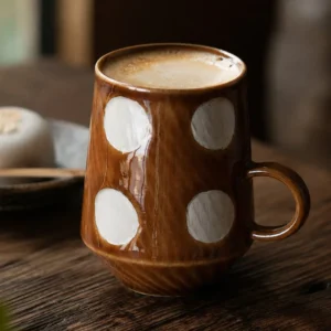 Artist-Made Amber Glaze Coffee Mug with White Dots in clay — front view