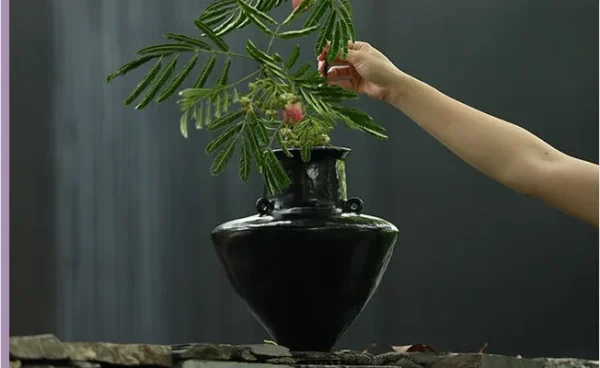 Artist-Made Black Lacquer Conical Twin-Ear Vase, Large in black — in a room setting