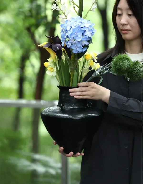 Artist-Made Black Lacquer Conical Twin-Ear Vase, Large in black — in a room setting