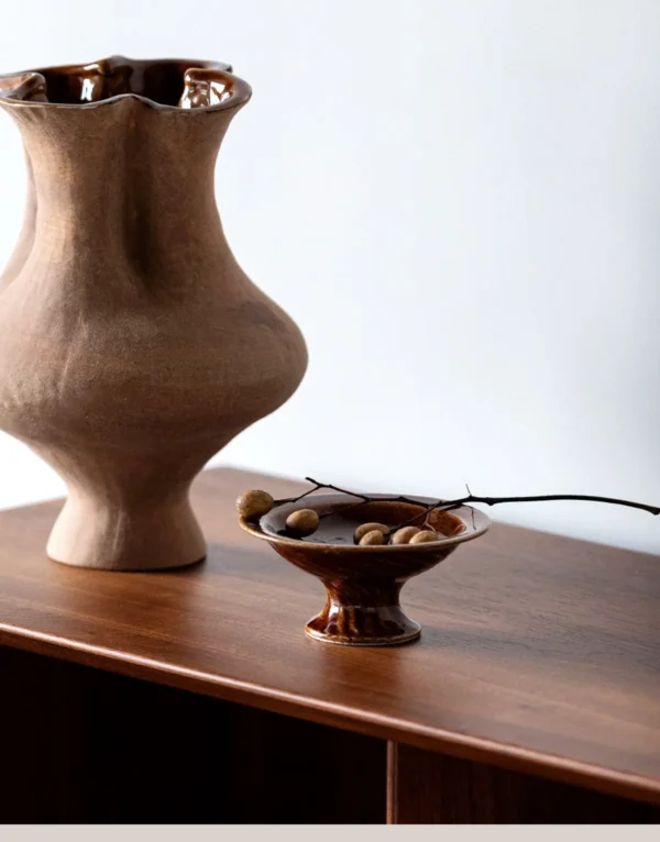 Artist-Made Footed Ceramic Dish in Glossy Brown Glaze — in a room setting