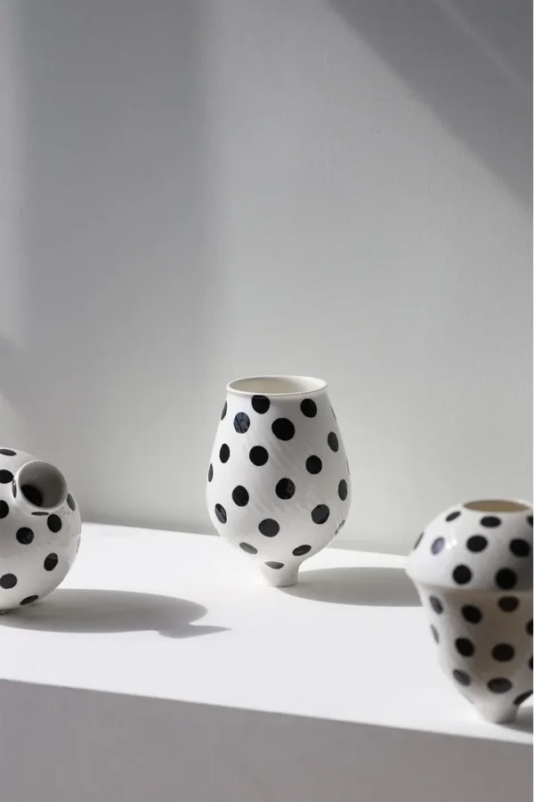 Designer Jingdezhen Polka Dot Spinning-Top Vase, Three Sizes in ivory — in a room setting