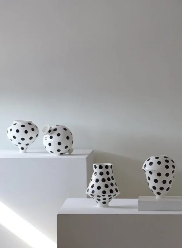 Designer Jingdezhen Polka Dot Spinning-Top Vase, Three Sizes in ivory — in a room setting
