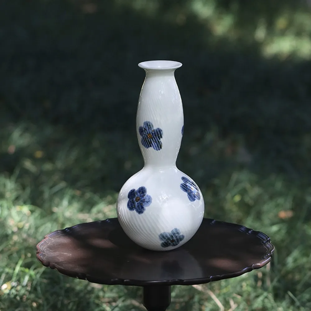 Designer Jingdezhen Blue Flower Ribbed Gourd Vase in ivory — front view
