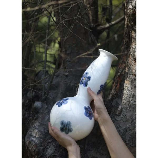 Designer Jingdezhen Blue Flower Ribbed Gourd Vase in ivory — in a room setting