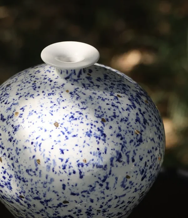 Designer Jingdezhen Blue Flower Ribbed Gourd Vase in ivory — in a room setting