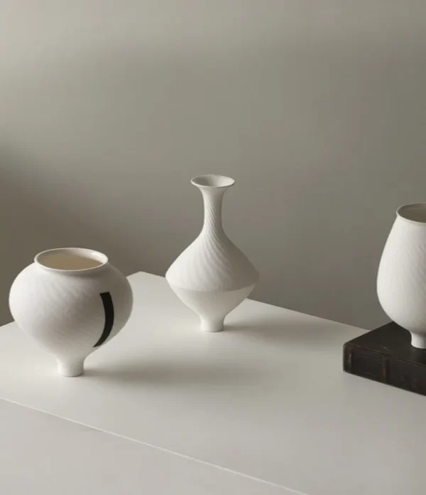 Jingdezhen White Bud Vases with Line Details, Three Sizes in ivory — in a room setting