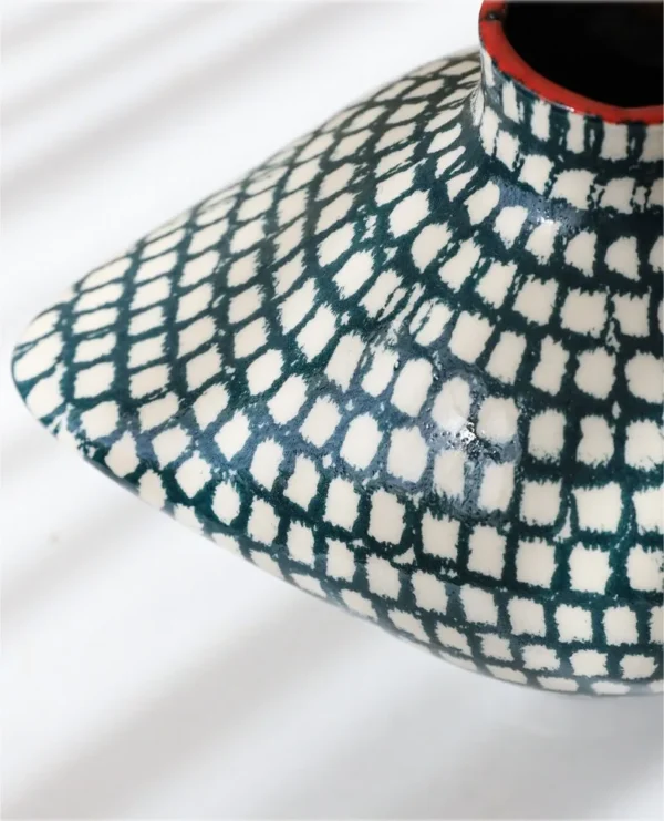Artist-Made Teal Grid Diamond Art Vessel with Red Rim in olive — in a room setting