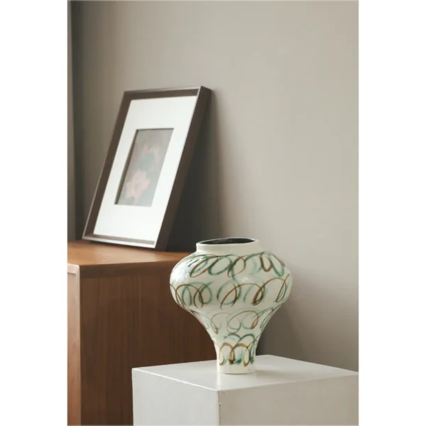 Artist-Made Abstract Loop Line Urn Vase in Cream, Medium — in a room setting