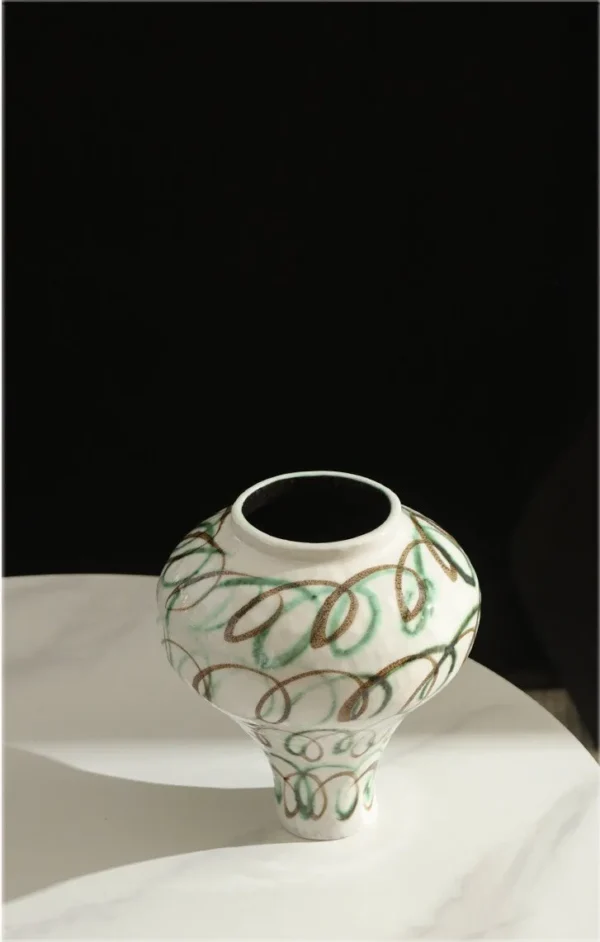Artist-Made Abstract Loop Line Urn Vase in Cream, Medium — in a room setting