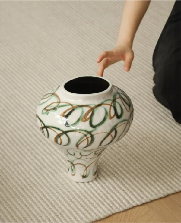 Artist-Made Abstract Loop Line Urn Vase in Cream, Medium — in a room setting