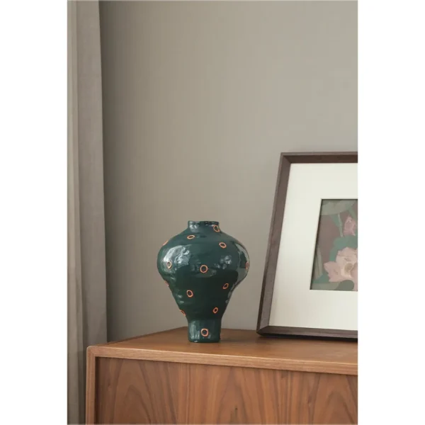 Artist-Made Dark Green Footed Vase in olive — in a room setting