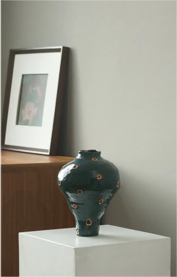 Artist-Made Dark Green Footed Vase in olive — in a room setting