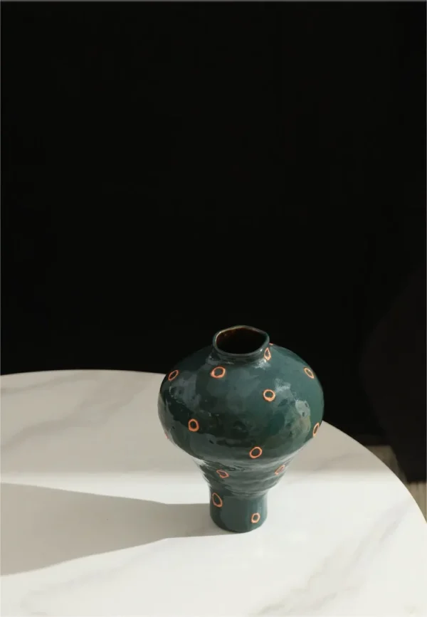 Artist-Made Dark Green Footed Vase in olive — in a room setting