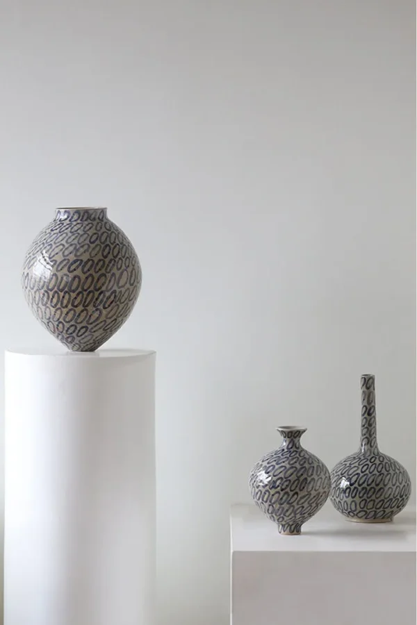 Designer Jingdezhen Ring-Pattern Ceramic Jar Vase, Large in sand — in a room setting