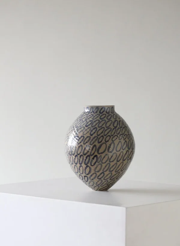 Designer Jingdezhen Ring-Pattern Ceramic Jar Vase, Large in sand — in a room setting