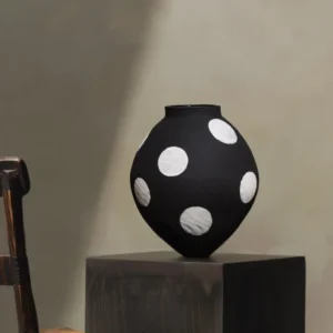 Designer Jingdezhen Black Polka Dot Wide Jar Vase, Large in black — in a room setting