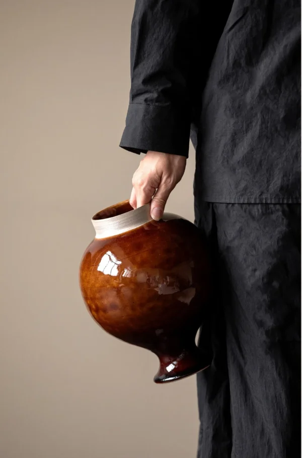 Artist-Made Kiln-Change Brown Glaze Round Stoneware Jar in clay — in a room setting