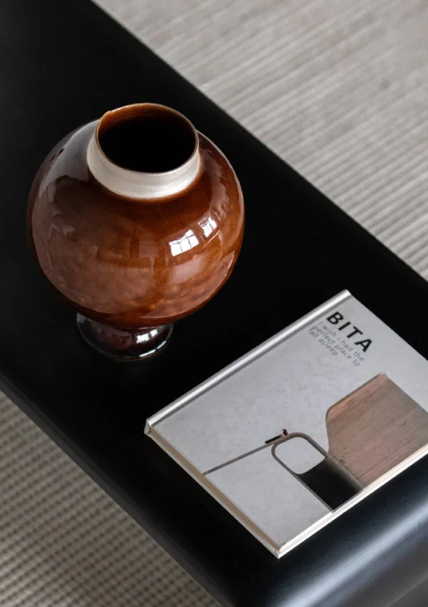 Artist-Made Kiln-Change Brown Glaze Round Stoneware Jar in clay — in a room setting