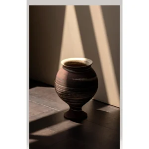 Artist-Made Marbled Clay Footed Cup Vase in Brown and Cream — in a room setting