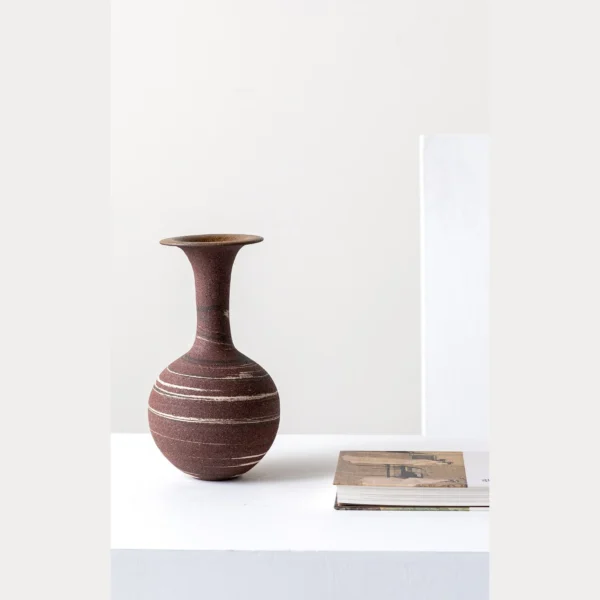 Artist-Made Marbled Stoneware Long-Neck Vase in burgundy — in a room setting