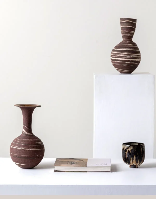 Artist-Made Marbled Stoneware Long-Neck Vase in burgundy — in a room setting