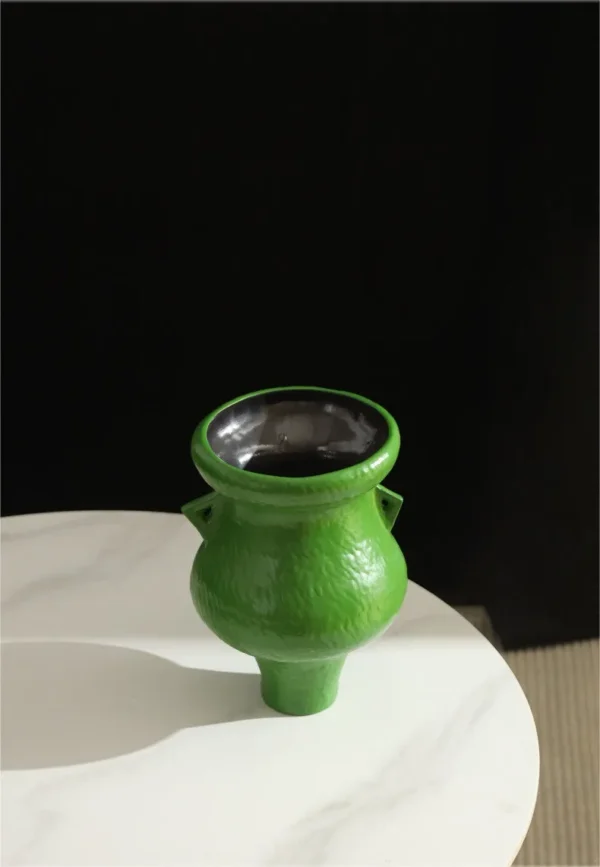 Artist-Made Bright Green Footed Urn Vase in olive — in a room setting