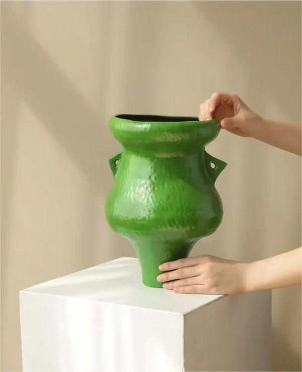 Artist-Made Bright Green Footed Urn Vase in olive — in a room setting