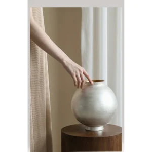 Artist-Made Silver Glaze Moon Jar, Jingdezhen in silver — in a room setting