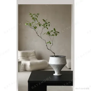 Artist-Made Stoneware Chalice Vase in ivory — in a room setting