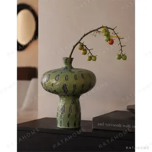 Artist-Made Green Speckled Mushroom Vase, Thousand Peaks in olive — in a room setting