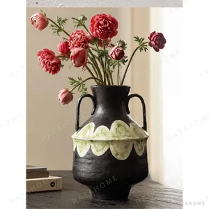 Artist-Made Stoneware Twin-Handle Amphora in black — in a room setting