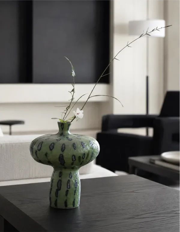 Artist-Made Green Spotted Mushroom Vase for TV Consoles in olive — in a room setting