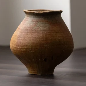 Artist-Made Ribbed Rust-Ochre Wide-Shoulder Jar in clay — front view